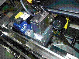 Austausch der Prägestation gegen ein Drucksystem mit integrierter Kamera zur Überprüfung des Druckergebnisses.